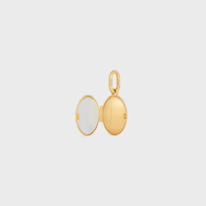 Anhänger Elefantenmedaillon aus Messing mit Goldfinish, Emaille und Stahl Anhänger Elefantenmedaillon aus Messing mit Goldfinish, Emaille und Stahl