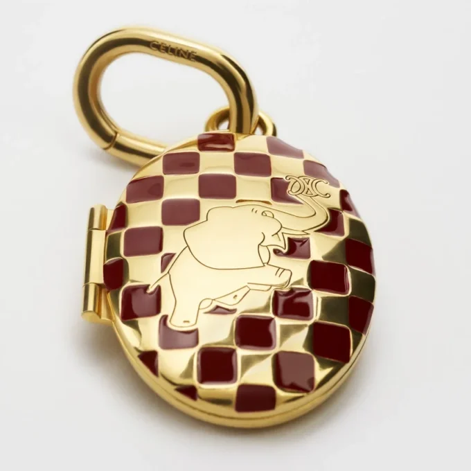Anhänger Elefantenmedaillon aus Messing mit Goldfinish, Emaille und Stahl Anhänger Elefantenmedaillon aus Messing mit Goldfinish, Emaille und Stahl
