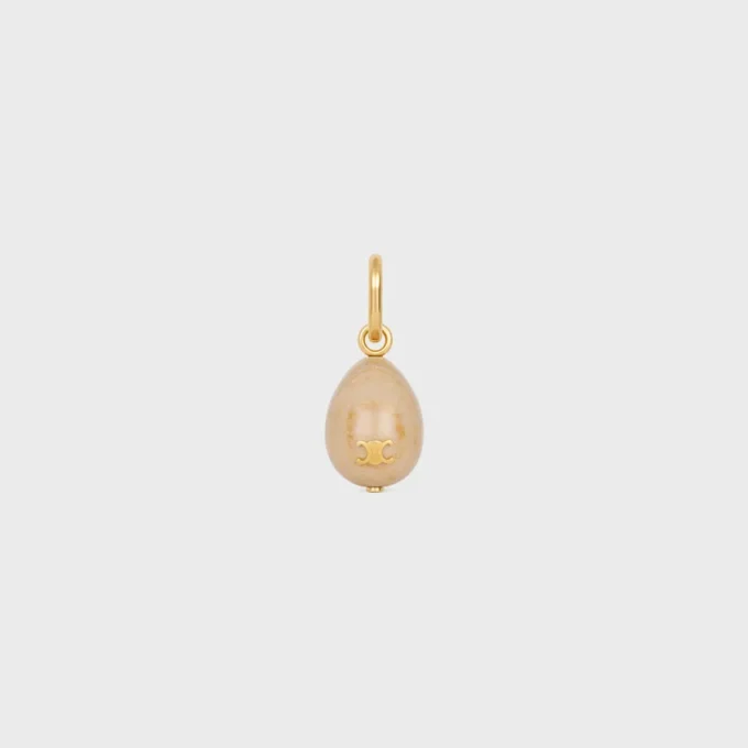 Anhänger „Stone Egg“ aus Botticino und Messing mit Goldfinish Anhänger „Stone Egg“ aus Botticino und Messing mit Goldfinish