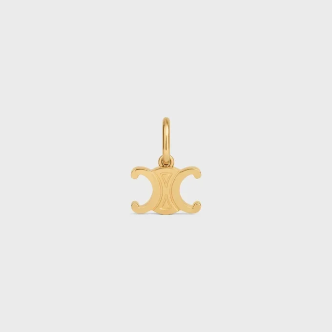 Anhänger „Triomphe“ aus Messing mit Goldfinish Anhänger „Triomphe“ aus Messing mit Goldfinish