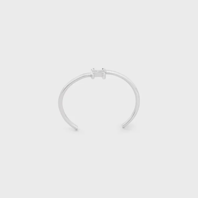 Asymmetrisches Triomphe-Armband aus Messing mit Rhodium-Finish Asymmetrisches Triomphe-Armband aus Messing mit Rhodium-Finish