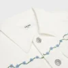 Bestickte Truckerjacke aus Raw-Wash-Denim in Weiß Bestickte Truckerjacke aus Raw-Wash-Denim in Weiß