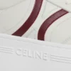 CELINE – Block-Sneaker mit Triomphe-Motiv auf der Rückseite und Keilsohle aus Kalbsleder CELINE – Block-Sneaker mit Triomphe-Motiv auf der Rückseite und Keilsohle aus Kalbsleder