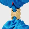 CELINE C Sulky Scrunchy aus Seide und Messing mit Goldfinish CELINE C Sulky Scrunchy aus Seide und Messing mit Goldfinish