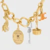 CELINE Charms Triomphe aus Emaille und Messing mit Goldfinish CELINE Charms Triomphe aus Emaille und Messing mit Goldfinish
