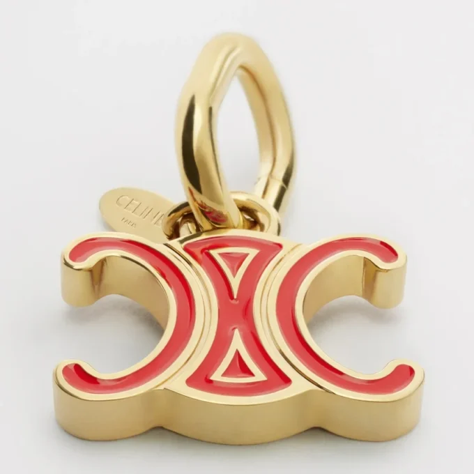 CELINE Charms Triomphe aus Emaille und Messing mit Goldfinish CELINE Charms Triomphe aus Emaille und Messing mit Goldfinish