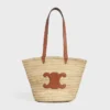 CELINE Classic Panier in mittlerer Größe aus Palmblättern und Kalbsleder CELINE Classic Panier in mittlerer Größe aus Palmblättern und Kalbsleder