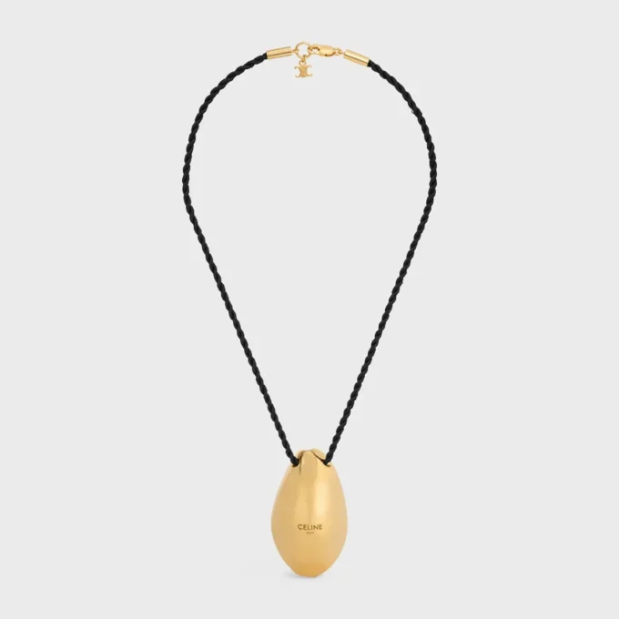 CELINE Dafila Muschel-Halskette aus Messing mit Goldfinish und Seide CELINE Dafila Muschel-Halskette aus Messing mit Goldfinish und Seide