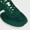 CELINE Jogger Low Schnürsneaker mit Triomphe-Motiv aus Wildleder und Kalbsleder CELINE Jogger Low Schnürsneaker mit Triomphe-Motiv aus Wildleder und Kalbsleder