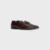 CELINE Malaquais Penny Triomphe Loafer aus poliertem Stierleder CELINE Malaquais Penny Triomphe Loafer aus poliertem Stierleder
