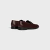 CELINE Malaquais Penny Triomphe Loafer aus poliertem Stierleder CELINE Malaquais Penny Triomphe Loafer aus poliertem Stierleder