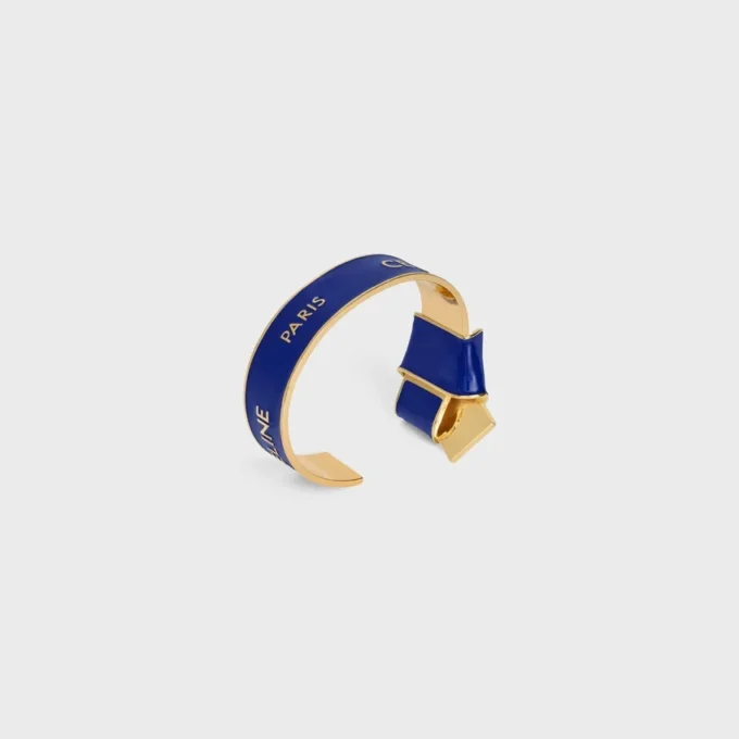 CELINE Ribbon Knotted Cuff aus Emaille und Messing mit Goldfinish