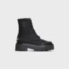 CELINE voluminöser Schnürstiefel aus Nylon und glänzendem Stierleder CELINE voluminöser Schnürstiefel aus Nylon und glänzendem Stierleder