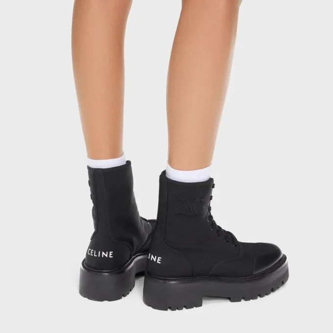 CELINE voluminöser Schnürstiefel aus Nylon und glänzendem Stierleder CELINE voluminöser Schnürstiefel aus Nylon und glänzendem Stierleder