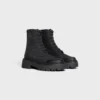CELINE voluminöser Schnürstiefel aus Nylon und glänzendem Stierleder CELINE voluminöser Schnürstiefel aus Nylon und glänzendem Stierleder