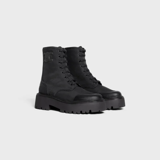 CELINE voluminöser Schnürstiefel aus Nylon und glänzendem Stierleder CELINE voluminöser Schnürstiefel aus Nylon und glänzendem Stierleder