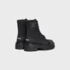 CELINE voluminöser Schnürstiefel aus Nylon und glänzendem Stierleder CELINE voluminöser Schnürstiefel aus Nylon und glänzendem Stierleder