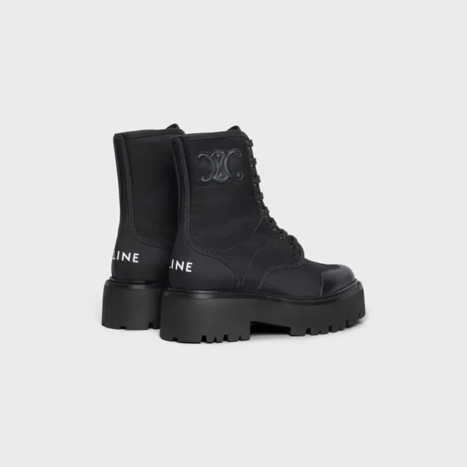 CELINE voluminöser Schnürstiefel aus Nylon und glänzendem Stierleder CELINE voluminöser Schnürstiefel aus Nylon und glänzendem Stierleder