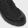CELINE voluminöser Schnürstiefel aus Nylon und glänzendem Stierleder CELINE voluminöser Schnürstiefel aus Nylon und glänzendem Stierleder