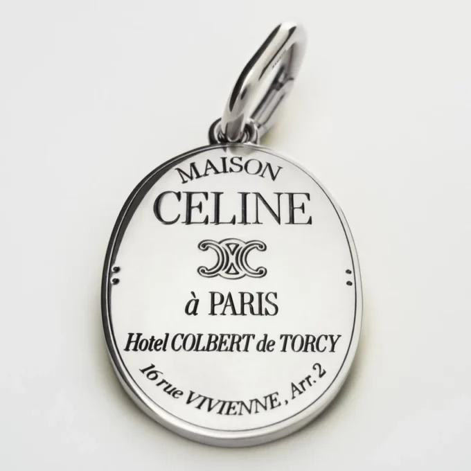 Charms CELINE-Medaillon aus Messing mit Rhodiumbeschichtung Charms CELINE-Medaillon aus Messing mit Rhodiumbeschichtung
