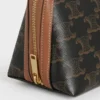 Clutch mit Kette aus Triomphe Canvas und Lammleder Clutch mit Kette aus Triomphe Canvas und Lammleder