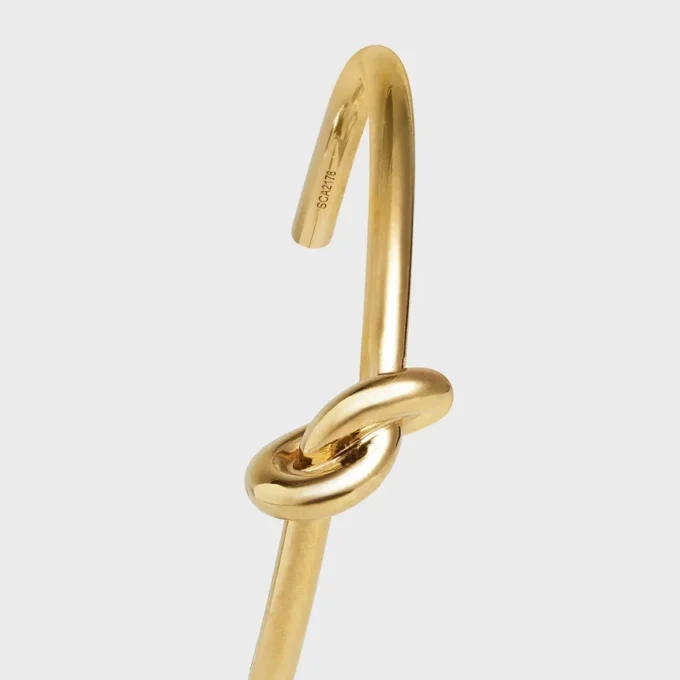 Extra-dünnes Armband „Knot“ aus Messing mit Goldfinish Extra-dünnes Armband „Knot“ aus Messing mit Goldfinish