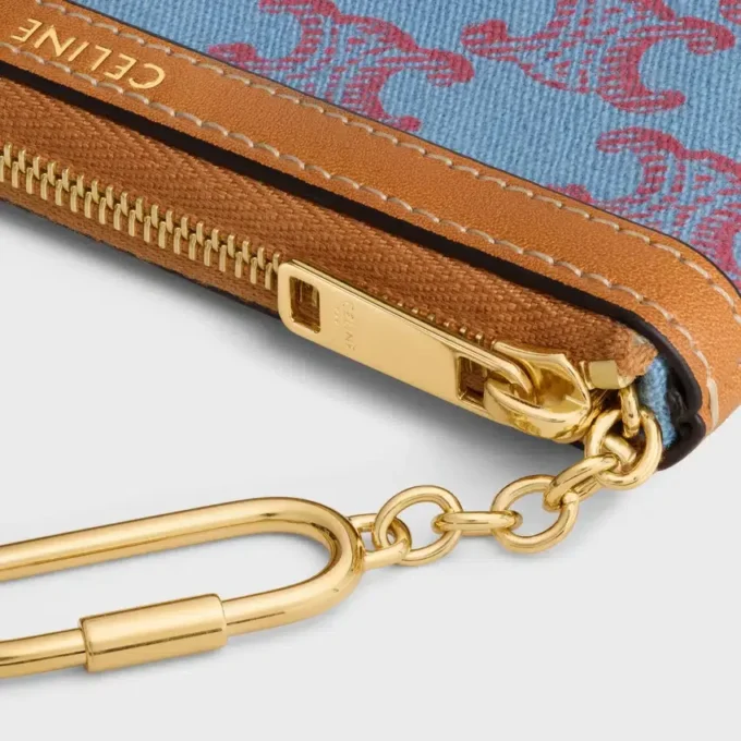 Geldbörse aus Textil mit durchgehendem Triomphe-Muster