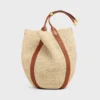 Große Beuteltasche aus Raffia und Kalbsleder Große Beuteltasche aus Raffia und Kalbsleder