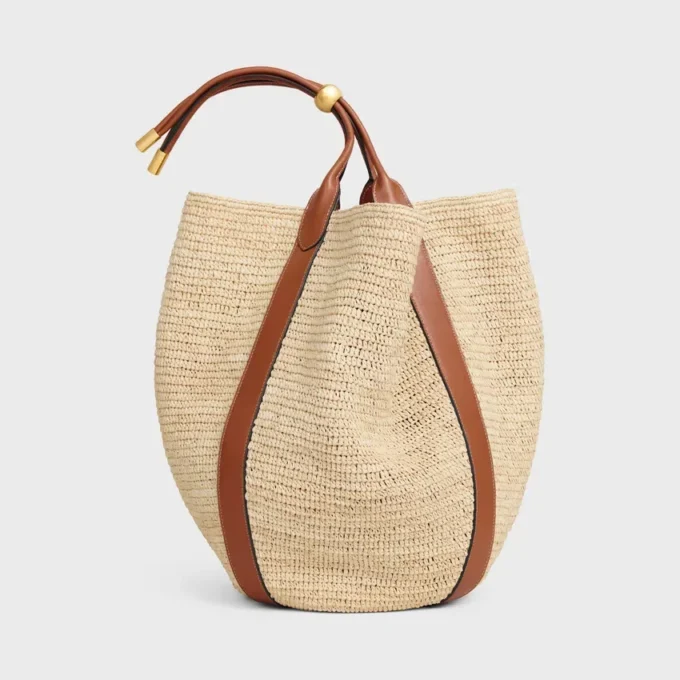 Große Beuteltasche aus Raffia und Kalbsleder Große Beuteltasche aus Raffia und Kalbsleder