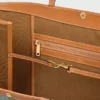 Große flache Einkaufstasche aus Triomphe Canvas Große flache Einkaufstasche aus Triomphe Canvas
