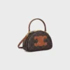 Half Moon Case aus Triomphe Canvas und Kalbsleder
