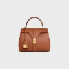 Kleine Tasche 16 aus naturfarbenem Kalbsleder Kleine Tasche 16 aus naturfarbenem Kalbsleder