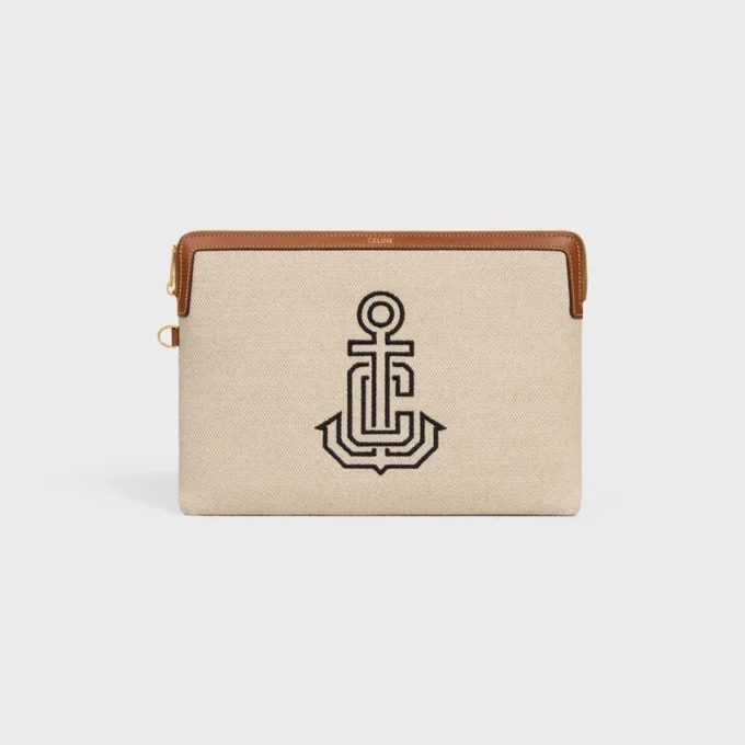 Kleine Tasche mit Riemen aus Textil mit Anker-Stickerei und Kalbsleder Kleine Tasche mit Riemen aus Textil mit Anker-Stickerei und Kalbsleder