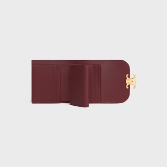 Kleine Triomphe-Brieftasche mit Klappe aus lackiertem Kalbsleder