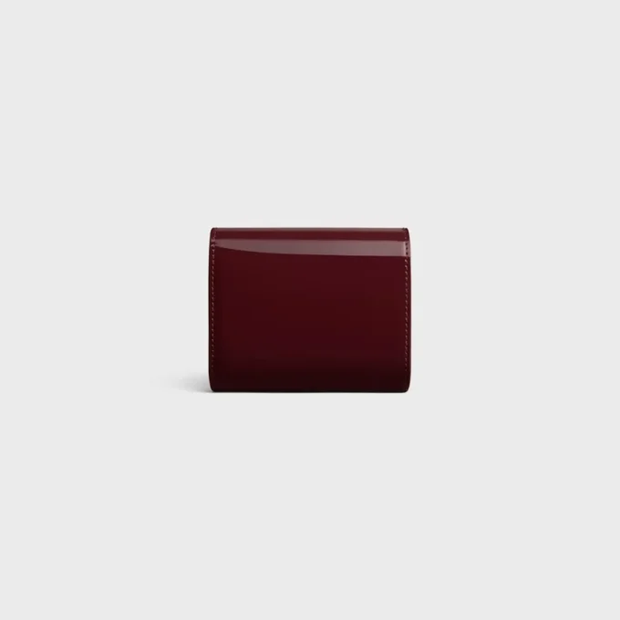 Kleine Triomphe-Brieftasche mit Klappe aus lackiertem Kalbsleder