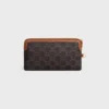 Lange Tasche mit Riemen aus Triomphe Canvas und Kalbsleder Lange Tasche mit Riemen aus Triomphe Canvas und Kalbsleder