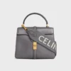 Langer Riemen aus Wolle mit CELINE-Jacquard