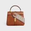 Langer Riemen aus Wolle mit CELINE-Jacquard
