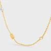 Les Perles CELINE Halskette aus Strass, Kunstharzperlen und Messing mit Goldfinish Les Perles CELINE Halskette aus Strass, Kunstharzperlen und Messing mit Goldfinish