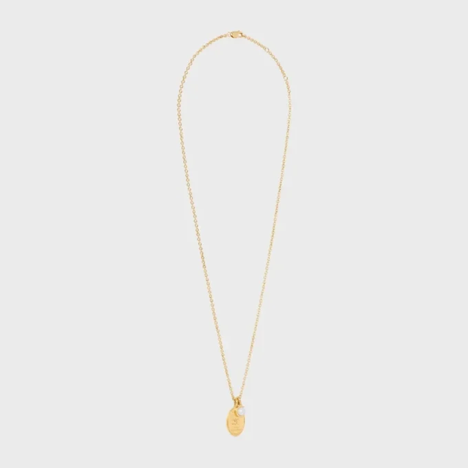 Les Perles CELINE Medaillon-Halskette aus Kunstharzperlen und Messing mit Goldfinish Les Perles CELINE Medaillon-Halskette aus Kunstharzperlen und Messing mit Goldfinish