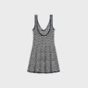 Mini-Skaterkleid aus gehäkelter Baumwolle Mini-Skaterkleid aus gehäkelter Baumwolle