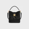 Mittlere Louise-Beuteltasche aus Raffia und Kalbsleder Mittlere Louise-Beuteltasche aus Raffia und Kalbsleder