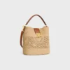 Mittlere Louise-Beuteltasche aus Raffia und Kalbsleder
