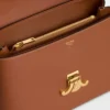 Mittlere Nino-Tasche aus geschmeidigem genarbtem Kalbsleder Mittlere Nino-Tasche aus geschmeidigem genarbtem Kalbsleder