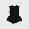 Peplum-Oberteil aus Wollseide Peplum-Oberteil aus Wollseide