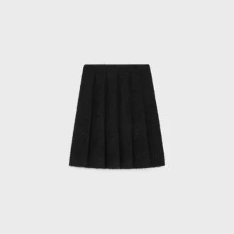 Plisseerock aus Bouclette Natta Plisseerock aus Bouclette Natta