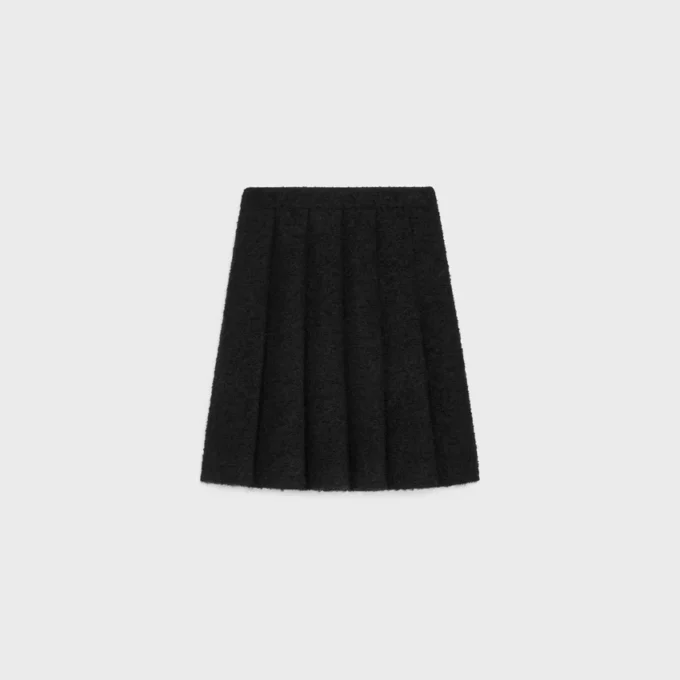 Plisseerock aus Bouclette Natta Plisseerock aus Bouclette Natta