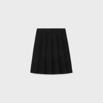 Plisseerock aus Bouclette Natta Plisseerock aus Bouclette Natta