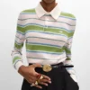 Polo-Pullover aus gestreifter Baumwolle Polo-Pullover aus gestreifter Baumwolle