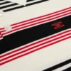 Polo-Pullover aus gestreifter Baumwolle Polo-Pullover aus gestreifter Baumwolle